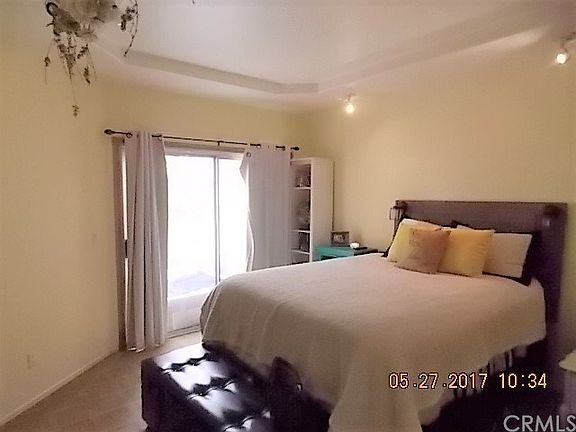 Master bedroom with sliding door to rear deck