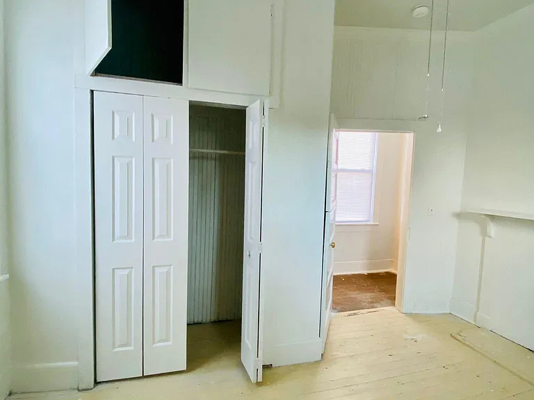 Bedroom: full closet, high ceilings with ceiling fan