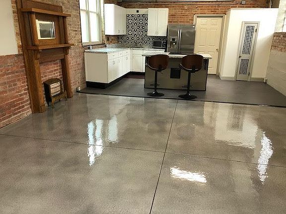 Large open living room and kitchen area ideal for entertaining or hunkering down in place.