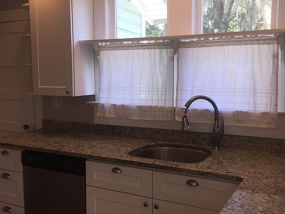 Granite countertops with stainless under mount sink.