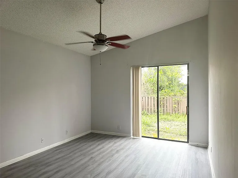 10461 NW 12th Ct — Photo 16