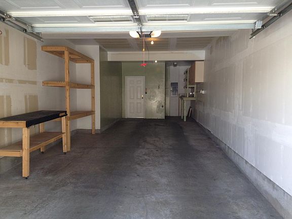 Large attached 2 car tandem garage