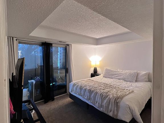 Main bedroom with access to 2nd floor balcony