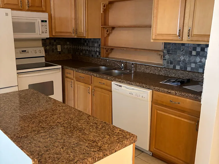 Oak wood cabinets in kitchen