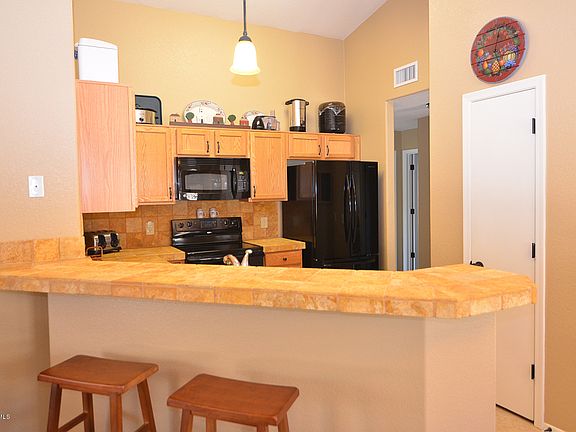 4th image of 9470 N Scarlet Tanager Ln NW