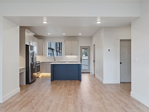 large kitchen island and dining area