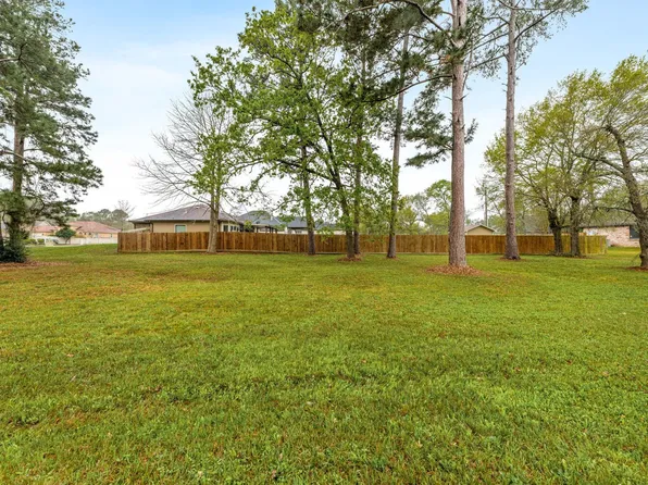 13083 Point Aquarius Blvd, Willis, TX 77318