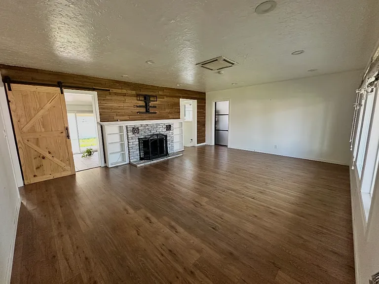 Beautifully Updated Ontario Home with Private Backyard, Fruit Trees, EV Charging & In-Unit Laundry — Photo 11