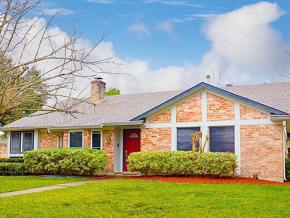 Situated off a quiet street on a nicely sized lot, this home affords plenty of front yard for your e
