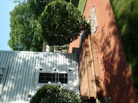 Side Entry Door is located off the Living Room inside.