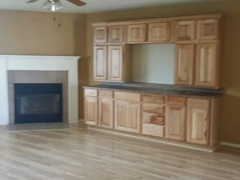 Livingroom/Fireplace with built-in entertainment center