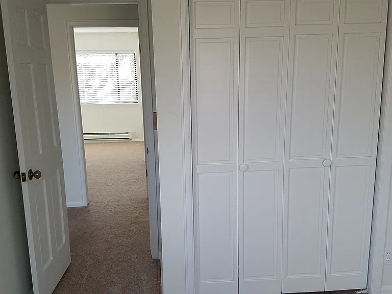 Upstairs Primary Bedroom Looking into 2nd Upstairs Bedroom