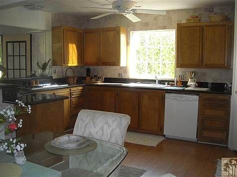 More kitchen - lots of cupboards and a really large pantry.