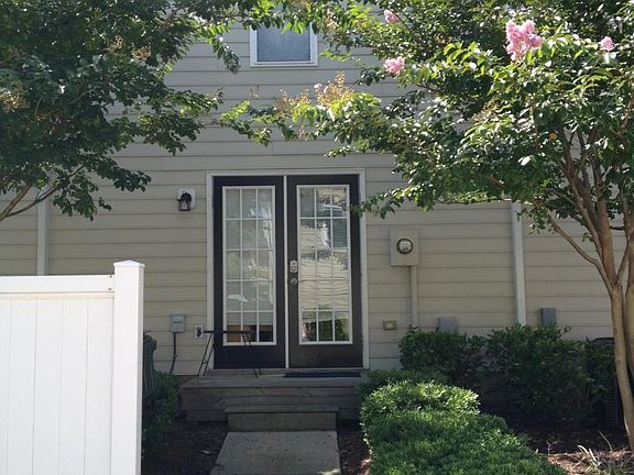 Back door leads to Kitchen - Parking in back.