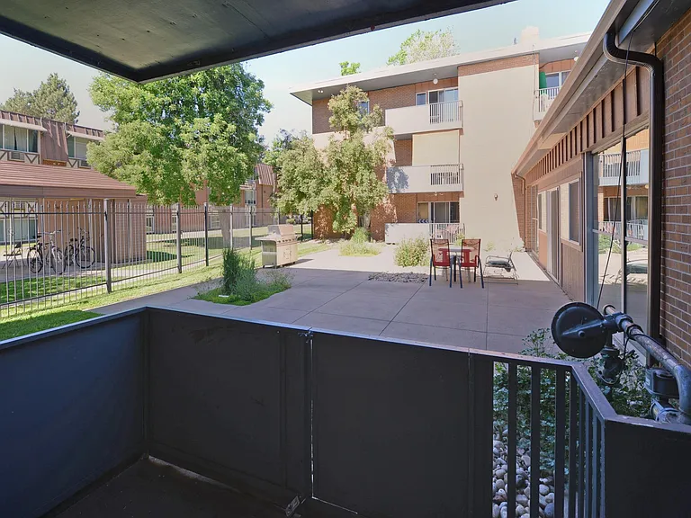 Balcony walks out to private, common, patio