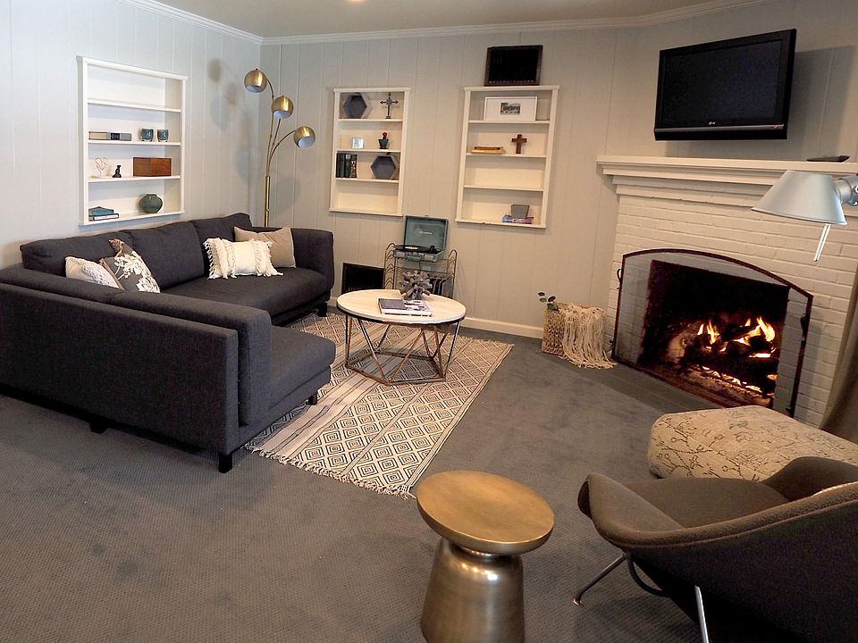 Large Bright Living Room with Gas Fireplace.