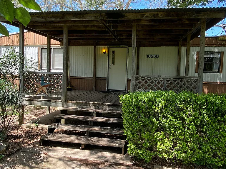 The large covered front porch, plenty of room for a table and chairs, great place for morning coffee!
