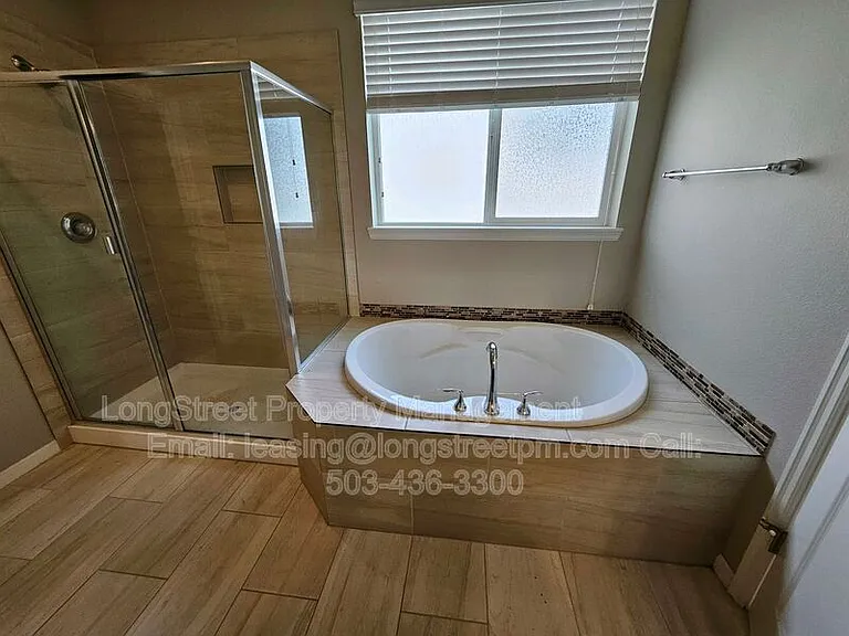 16992 NW Tristan St — Photo 25