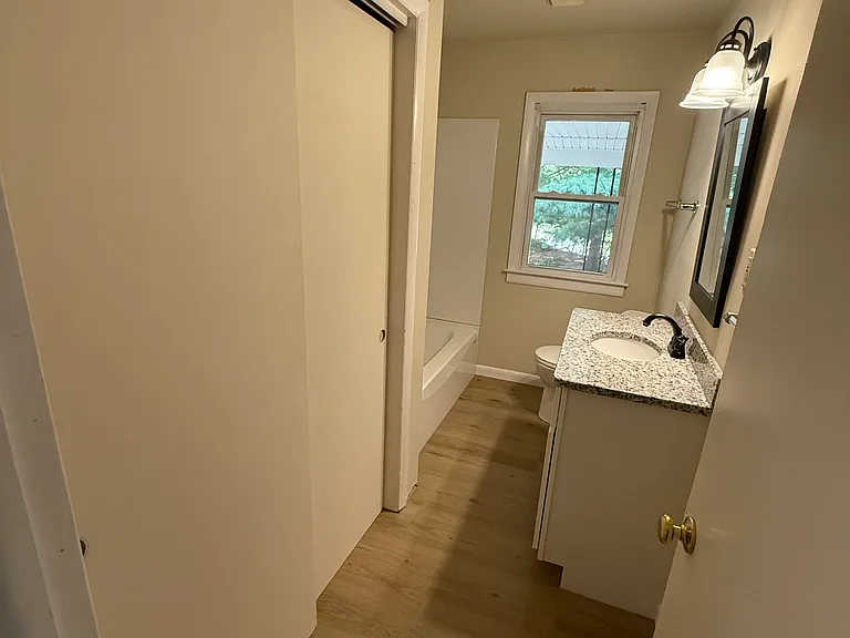 Bathroom includes large closet