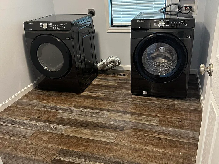 Third bedroom - used as laundry with Samsung washer and dryer