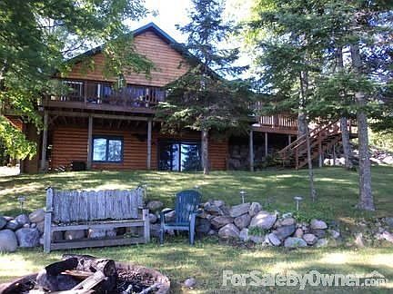 Lake Side of House
						:
						The rear of the house offers stunning views of this peaceful, quiet lake.