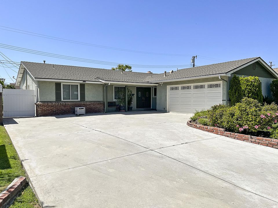 Front - Large Driveway with Two Car Garage