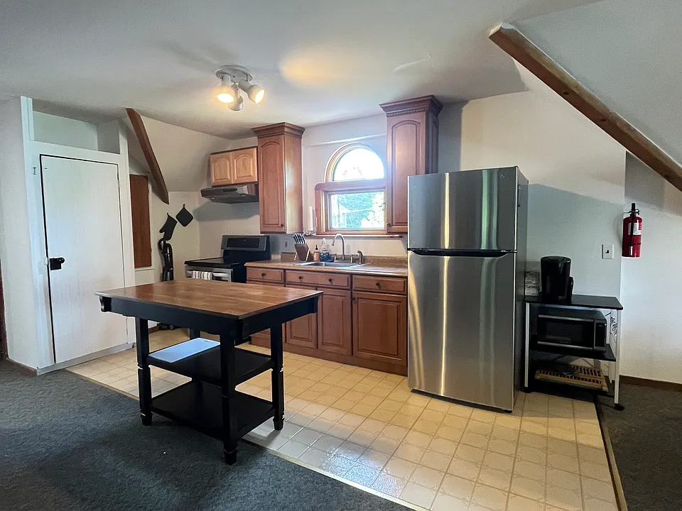 Kitchen is fully stocked with plates, cups, mugs, cookware, utensils, keurig and regular coffee pot, etc.