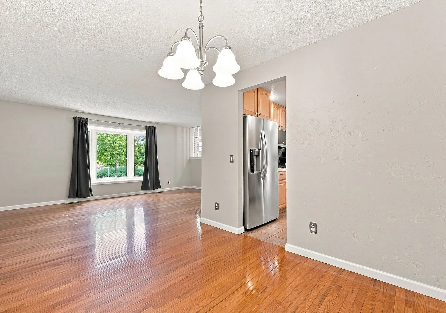 Updated With Stainless Appliances, New Paint, Finished Basement, Sun Room And Patio! Available Now! — Photo 4