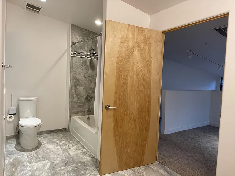 Upstairs bathroom at 3202 "The Edward" loft.