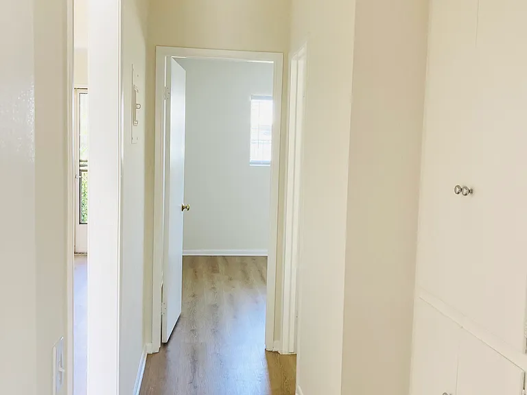 Hallway with linen closet