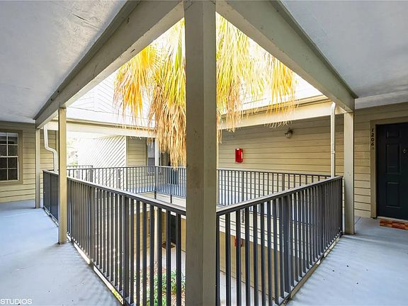 Outside - top of the stairs facing front entrance door