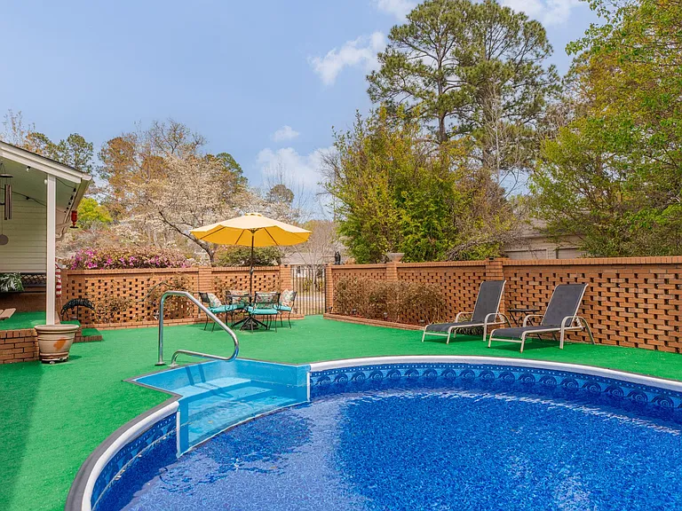 Outdoor Pool area w/Salt water pool & spacious hangout spots