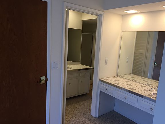 Master Bedroom - seated vanity/makeup area and private bathr