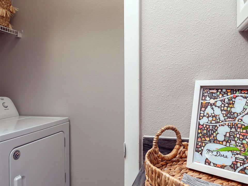 All apartment homes include a full-size washer and dryer in a private laundry nook featuring built-in shelving.