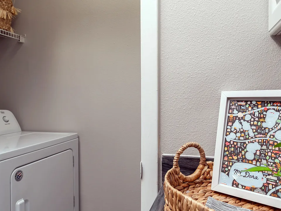 All apartment homes include a full-size washer and dryer in a private laundry nook featuring built-in shelving.
