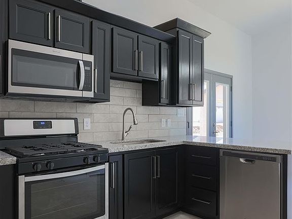 3rd image of 8694 E 40th Ln