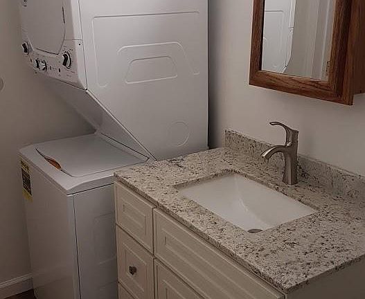 Front bathroom with brand new washer-dryer