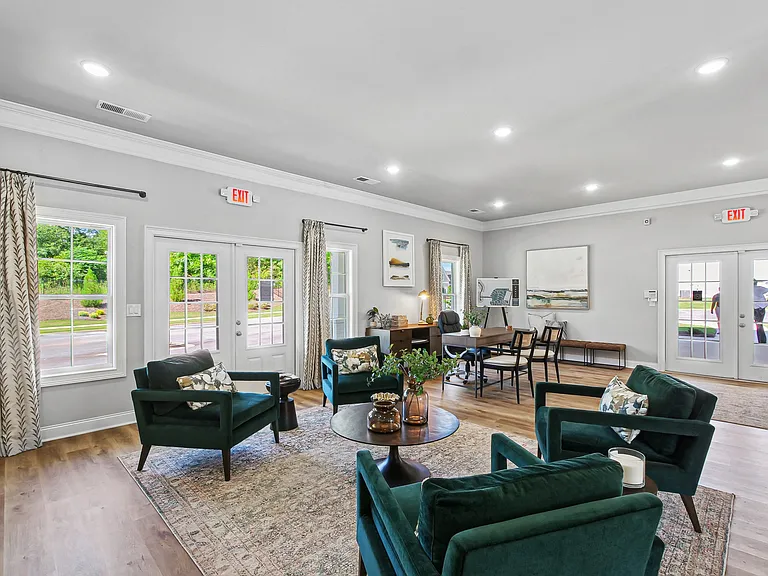 Elegant clubhouse living area featuring generous seating.