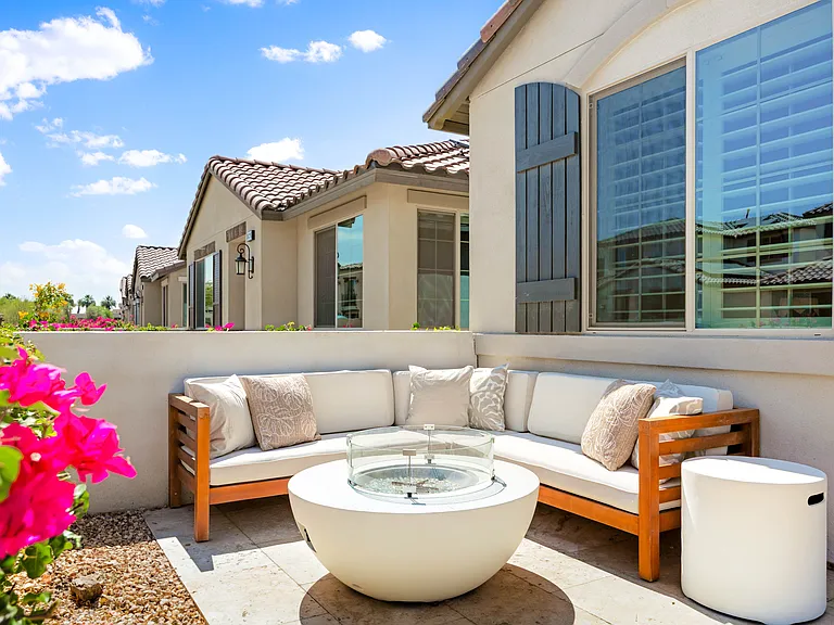 Cozy patio seating with a natural gas fire pit!
