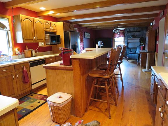 Kitchen with familyrm in distance.JPG