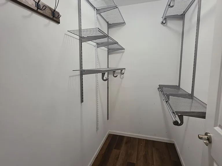 walk-in closet in master bedroom