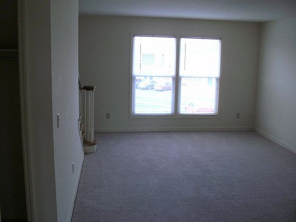spacious living room, staircase