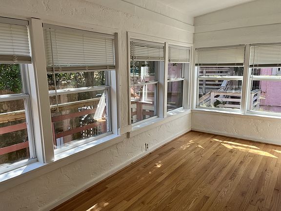 Florida room with new hardwood floor.