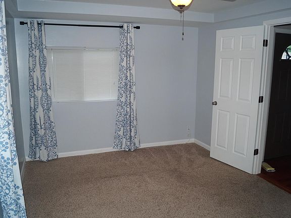 Master bedroom with walk in closet and private bath