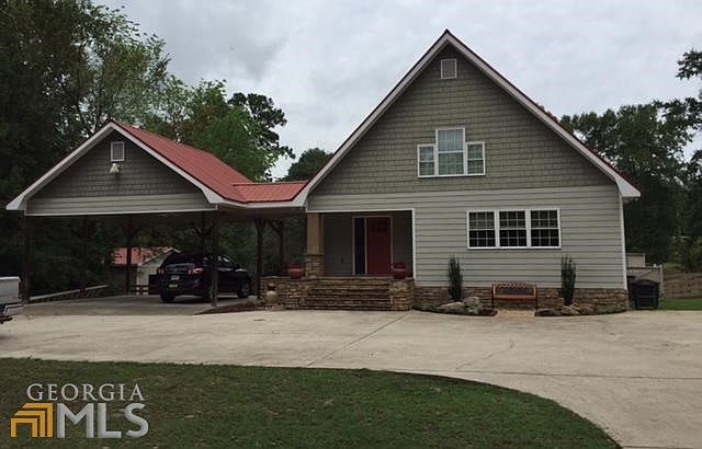 Charming Craftsman features concrete siding and steel roof for low maintenance and high longevity. P