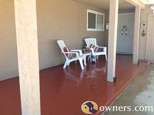 Front covered patio 26 ft long for entertaining