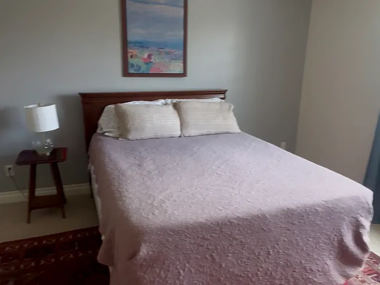 2nd bedroom upstairs (largest bedroom). Largest closet. Door straight to bathroom, view over backyard