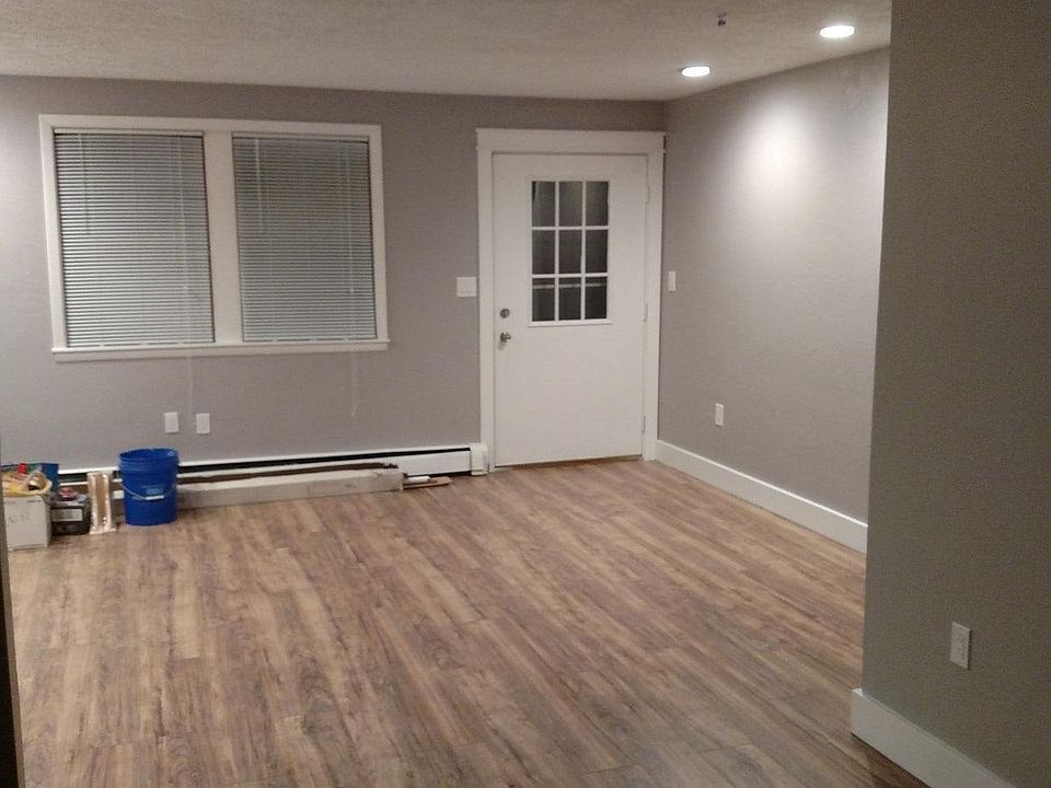 The front entrance which could be a sitting room or a dining room. (Please excuse the building materials laying about.)