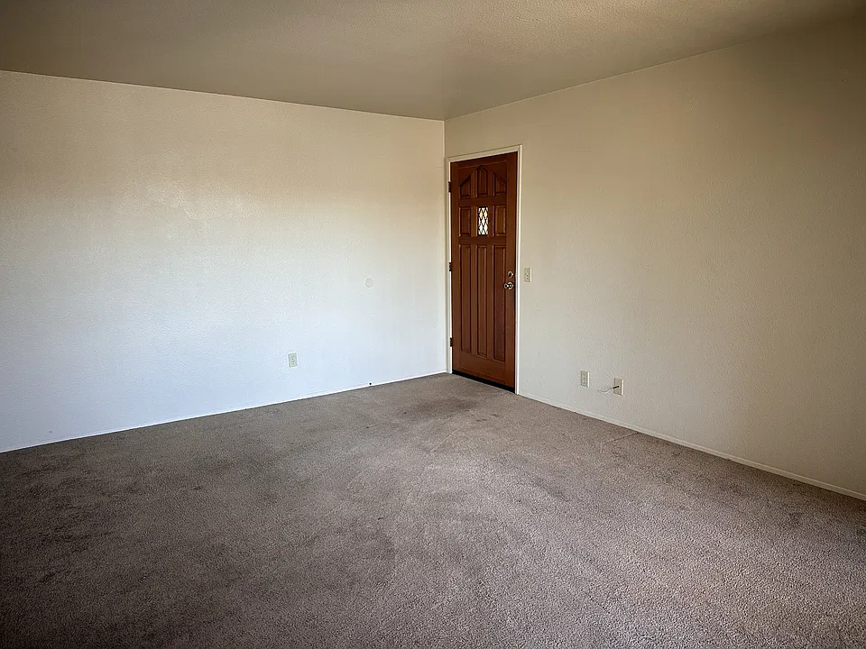 Living room (looking toward door)
