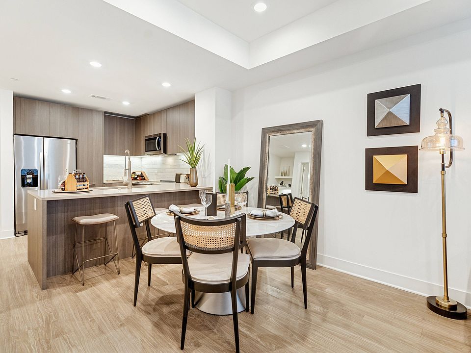 Wood-style flooring in living and dining areas